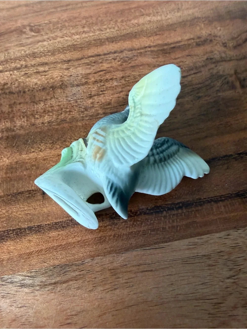 Vintage tiny hand-painted ceramic or porcelain quail figurine